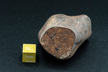 Inside slice of Chondrite Meteorite L Type isolated, piece of rock formed in outer space in the...