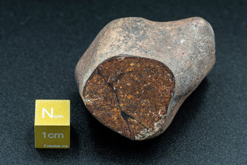 Inside slice of Chondrite Meteorite L Type isolated, piece of rock formed in outer space in the early stages of Solar System as asteroids. This meteorite comes from an asteroid fall at Atacama Desert © abriendomundo
