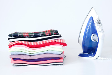 a pile of colorful clothes on white background