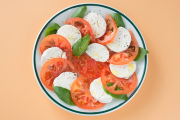 Caprese salad in brown background