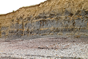 The cliffs at Kilve beach near East Quantoxhead in Somerset, England. Stratified layers of rock...