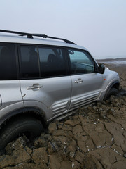 Fototapeta na wymiar off road 4x4 car in mud