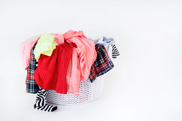 a pile of colorful clothes on white background