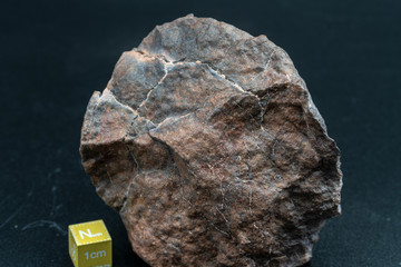 Chondrite Meteorite L6W2 Type isolated, piece of rock formed as an asteroid in the universe at during Solar System creation. The meteorite comes from an asteroid fall impacting Earth at Atacama Desert