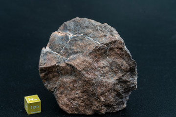 Chondrite Meteorite L6W2 Type isolated, piece of rock formed as an asteroid in the universe at during Solar System creation. The meteorite comes from an asteroid fall impacting Earth at Atacama Desert