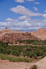 Ancient casbah of Tifoultoute with green gorge, surrounded by desert, Morocco, Africa