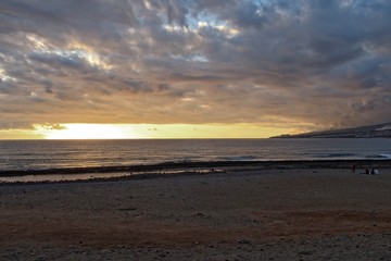  picturesque ocean landscape with the setting sun in a tropical country during summer holidays