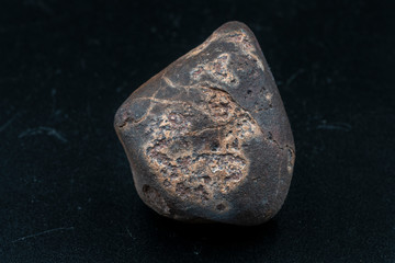 Chondrite Meteorite L6W2 Type isolated, piece of rock formed as an asteroid in the universe at during Solar System creation. The meteorite comes from an asteroid fall impacting Earth at Atacama Desert © abriendomundo