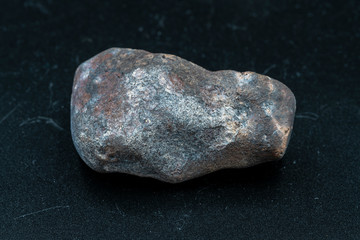 Chondrite Meteorite L6W2 Type isolated, piece of rock formed as an asteroid in the universe at during Solar System creation. The meteorite comes from an asteroid fall impacting Earth at Atacama Desert