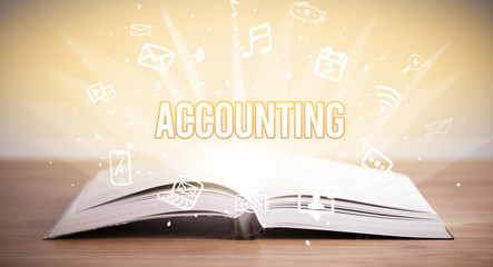 Opeen book with ACCOUNTING inscription, business concept