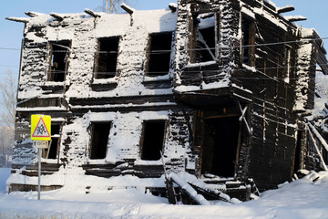 Fototapeta premium Burned-Down Wooden House