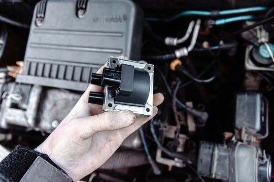 Replacing The Ignition Coil Of A Car.