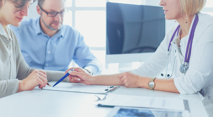 doctor prescribes medication to the senior patient