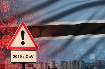 Botswana flag and Coronavirus 2019-nCoV alert sign. Concept of high probability of novel...