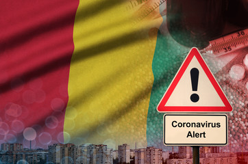 Guinea flag and Coronavirus 2019-nCoV alert sign. Concept of high probability of novel coronavirus...
