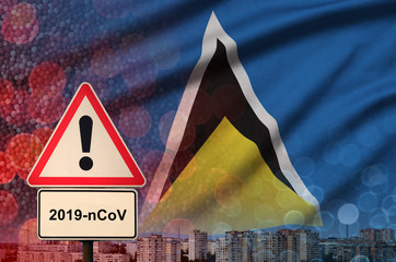 Saint Lucia flag and Coronavirus 2019-nCoV alert sign. Concept of high probability of novel...