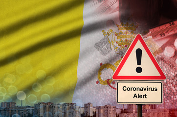 Vatican City State flag and Coronavirus 2019-nCoV alert sign. Concept of high probability of novel...
