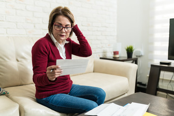 Retired Woman Planning Home Finances