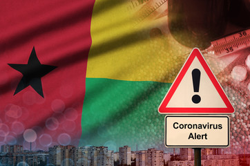 Guinea Bissau flag and Coronavirus 2019-nCoV alert sign. Concept of high probability of novel...