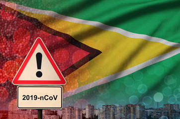 Guyana flag and Coronavirus 2019-nCoV alert sign. Concept of high probability of novel coronavirus...