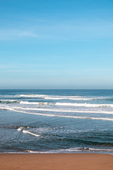 Ocean waves to the horizon in Donostia, San Sebastian, Spain