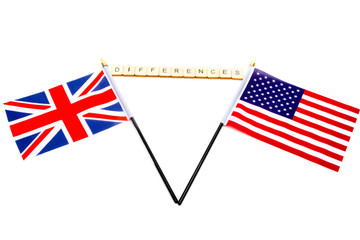 The flags of the United Kingdom and the United States isolated on a white background with a sign reading Differences