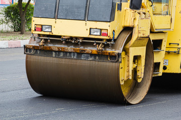 The rink compacts the road surface, road repair in the street in the city