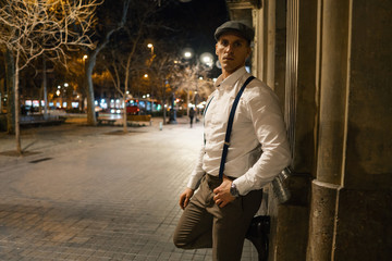 Old Fashion Man from the 1920s england walking along an old street of a historic city