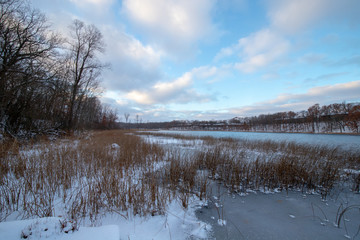 Fototapeta na wymiar Frozen lake landscape in Michigan