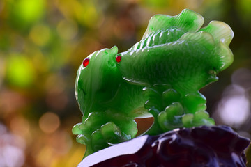  Jade carving of two beautiful fishes On a natural background