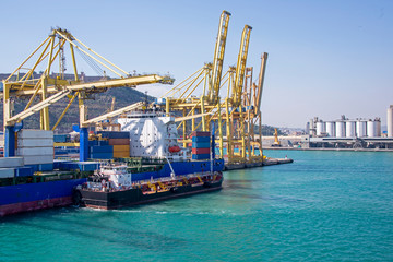 Fototapeta premium Freighter berthed at ocean dock