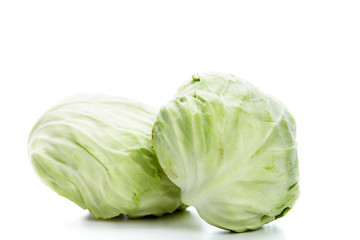 Fototapeta premium Fresh green cabbage on white background.