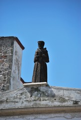 Statue of monk in catholic church