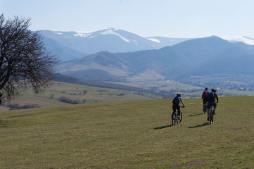 Fototapeta na wymiar Mountain bikers in alpine landscape. Sport, Mountain Bike cyclist riding 