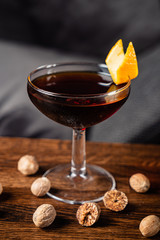 cocktail with nutmeg on the wooden table