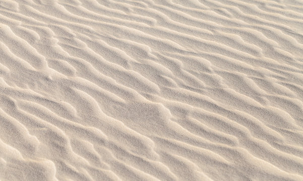 Sand ripples, natural photo with selective focus. Abstract photo texture