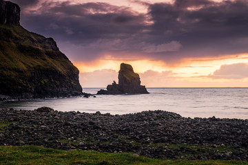 Sunset view of the rocky Talisker Beach