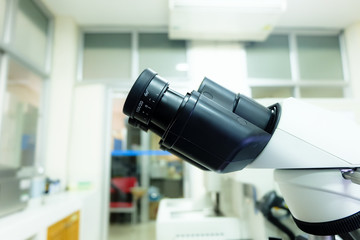 Microscope in laboratory for investigetion testing.