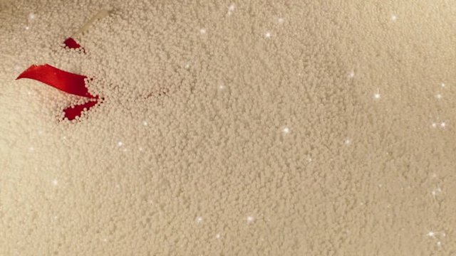 beautiful gift on a white background lies in styrofoam balls with blasts