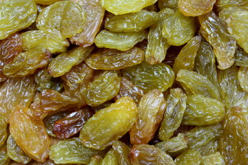 Texture yellow dry wrinkled grapes- raisins