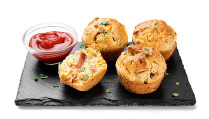 Savory muffins with bacon, green onion and cheese. isolated on white background. 
