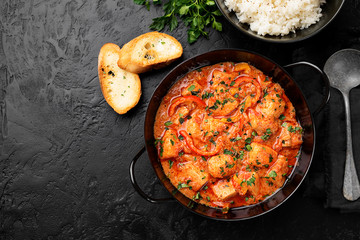 Fish Stew cooked in a delicious  rich and fragrant broth, topped with fresh parsley and served with  rice.