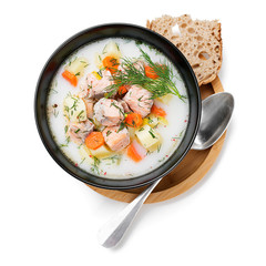 Creamy soup with salmon, potatoes, carrots and dill. Healthy food. isolated on white background	