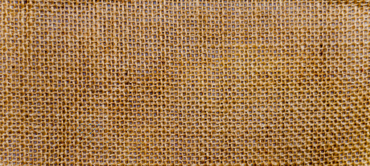 Horizontal close-up image of burlap bag detail