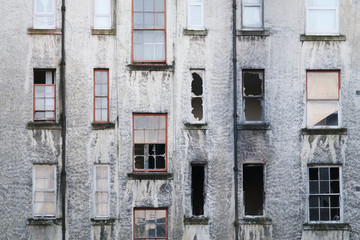 Derelict abandoned council house in poor housing crisis ghetto estate slum in Port Glasgow uk