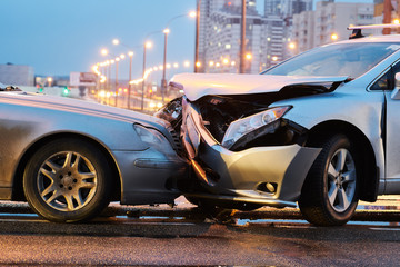 automobile crash accident on street. damaged cars - 319978476