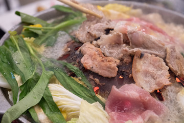 Thai barbecue grill pork on hot pan buffet