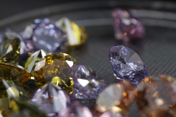 Close up shot of beautiful multi color crystal zirconia diamonds beads for jewelry 