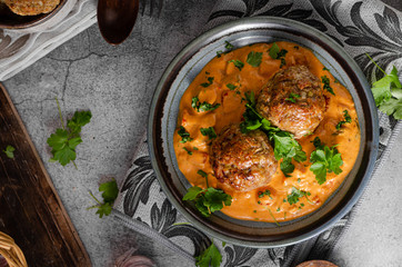 Grilled meatball with curry tomato sauce