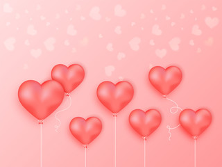 Glossy Heart Balloons on Light Red Background.